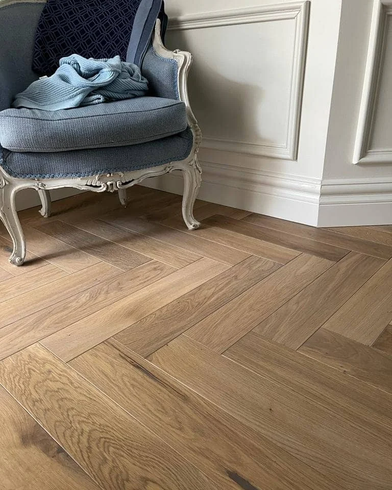 Natural wood herringbone flooring