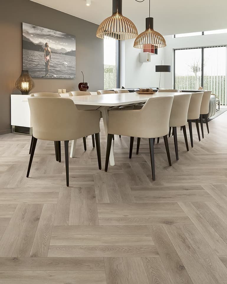 Wood-effect flooring in a bright dining room